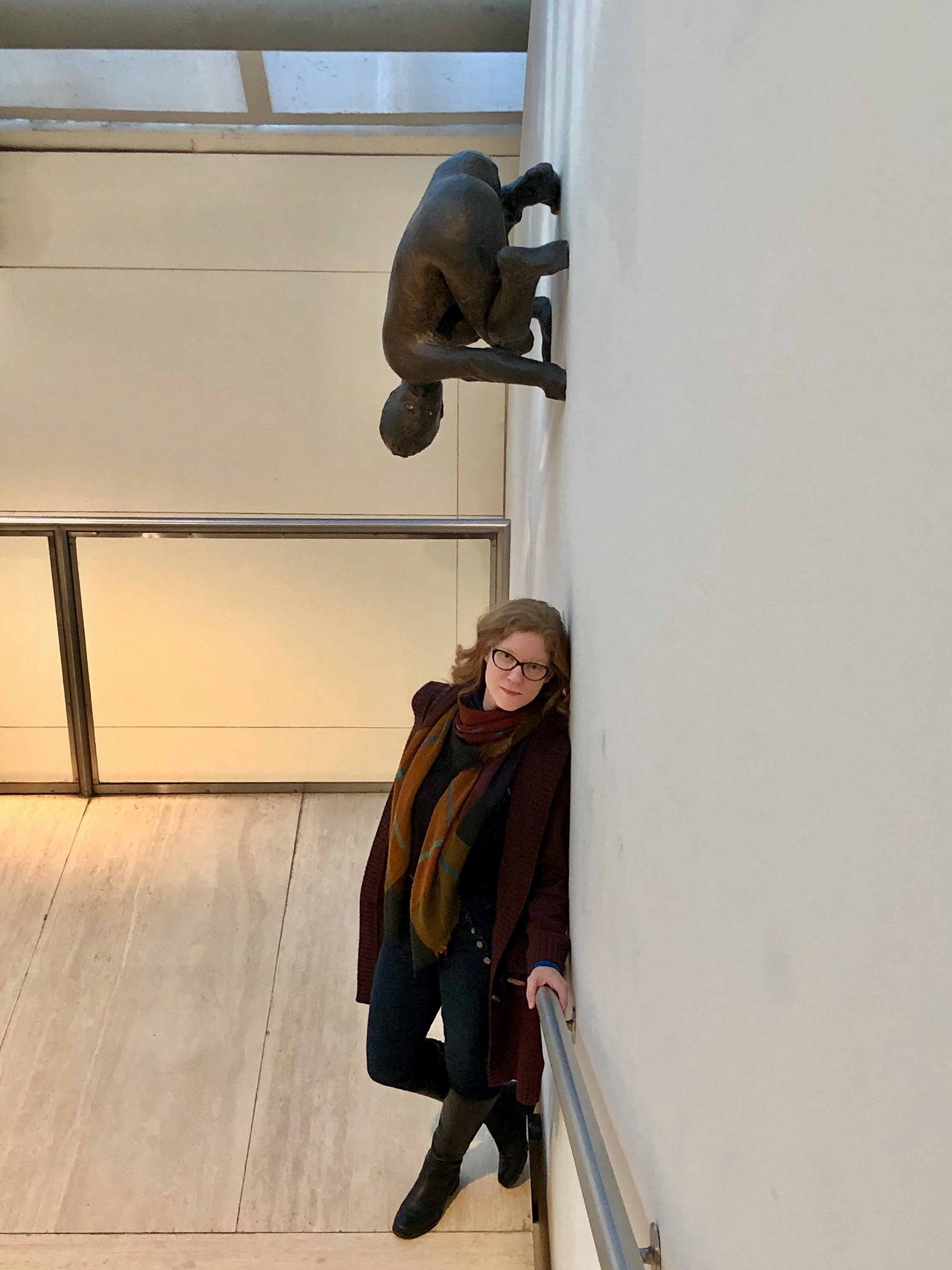 Nicole standing near the artwork Lilith by Kiki Smith